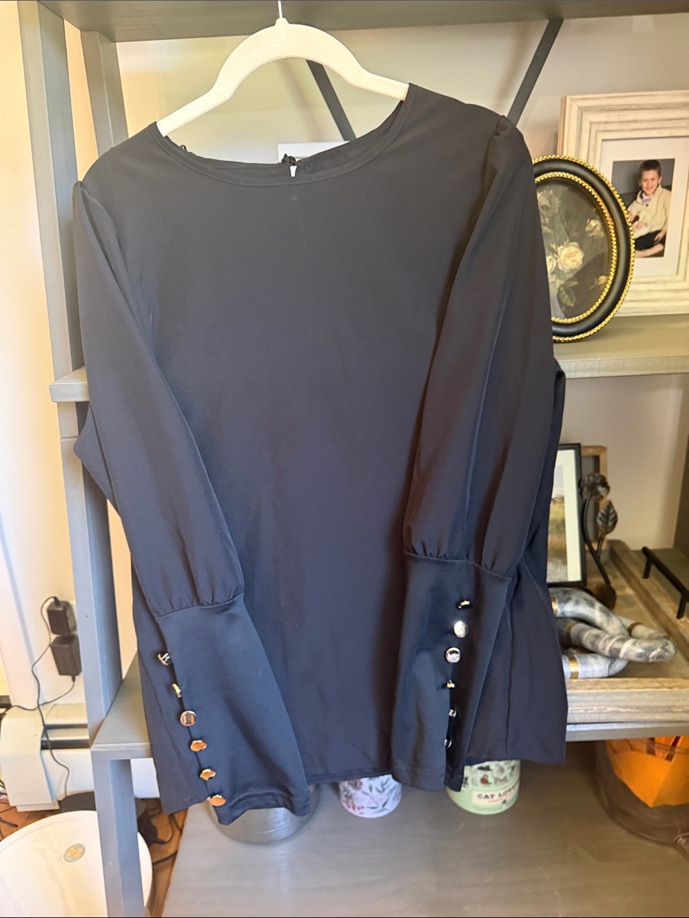 Elegant Black Long-Sleeve Blouse with Decorative Cuff Buttons